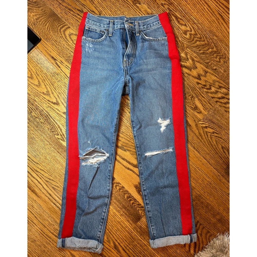 Carmar straight legged jeans with rip and red stripe on each side
